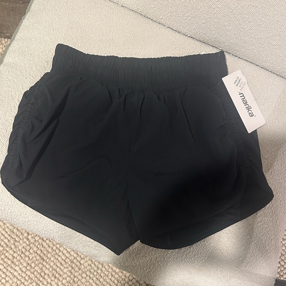 Marika Women's Classic Black Athletic Shorts with scrunch detail on sides.